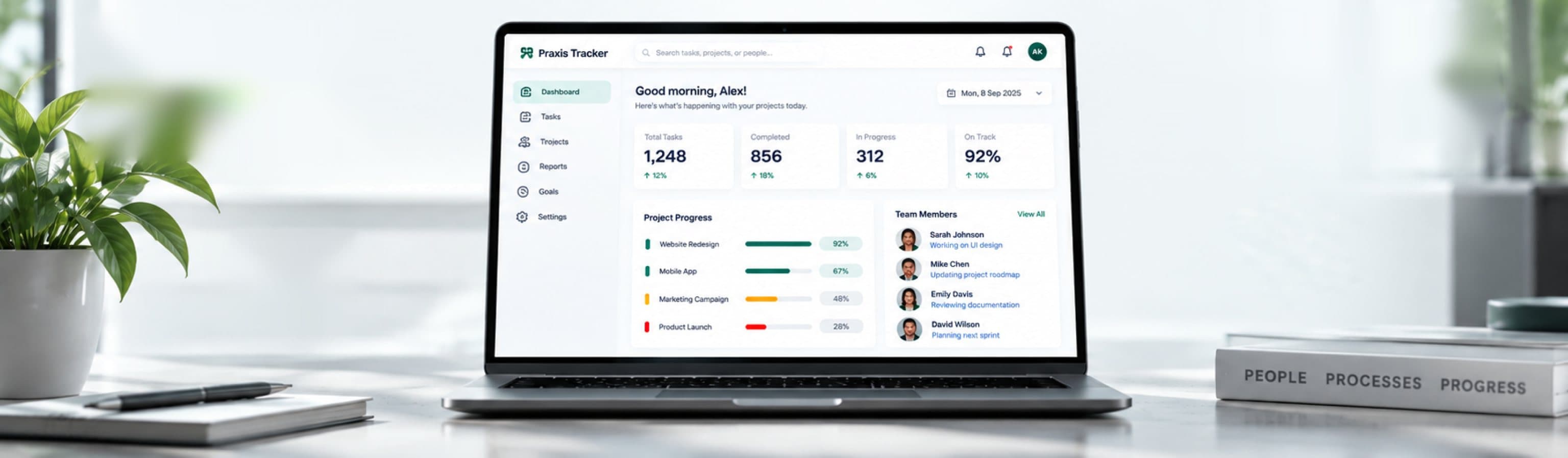 The Praxis Tracker dashboard on a laptop